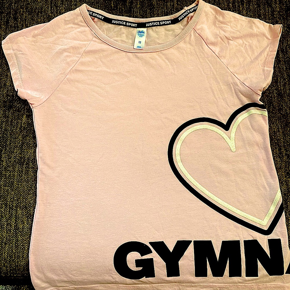 Justice sport shirt creamy pink and a black and sparkle white heart.